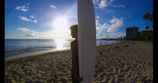 Surfer at Sunset on Tropical Beach with Surfboard - Download Free Stock Images Pikwizard.com