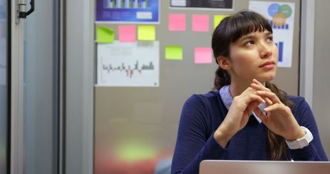 contemplative businesswoman in modern office enviornment - Download Free Stock Images Pikwizard.com