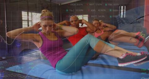 Crunching Group Fitness Class with Stock Market Overlay for Training Concept
