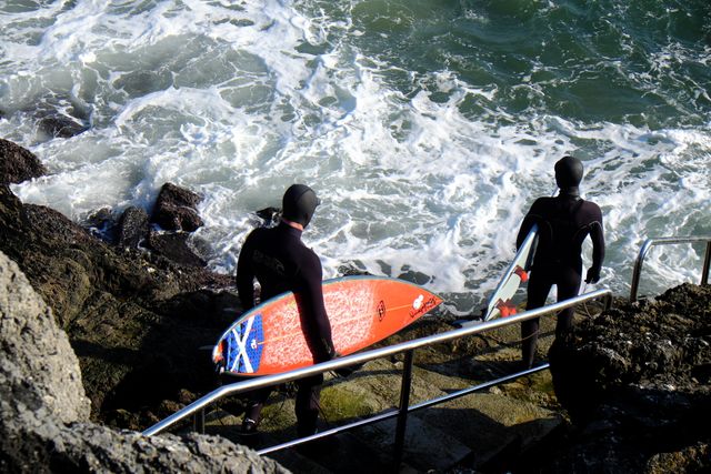 Surfers Descending Staircase towards Ocean - Download Free Stock Photos Pikwizard.com