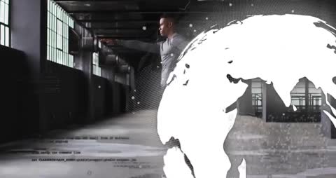 Man Innovating in Industrial Workspace with Digital Globe Overlay