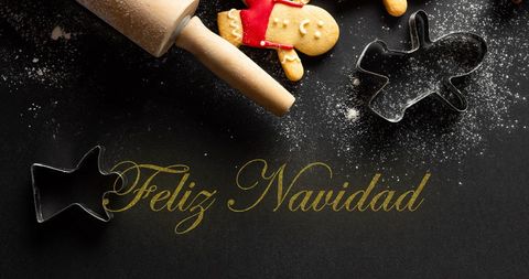 Feliz Navidad Text with Christmas Cookies and Baking Tools - Download Free Stock Images Pikwizard.com