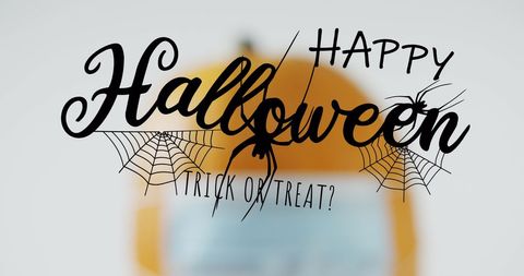 Halloween Greeting with Masked Pumpkin Display