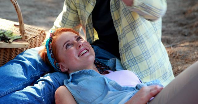 Smiling Woman Relaxing During Outdoor Picnic - Download Free Stock Images Pikwizard.com