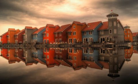 Colorful Dutch Houses Reflecting in Tranquil Water