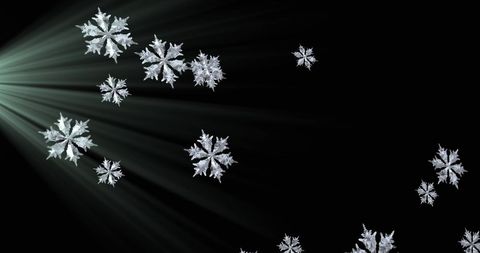 Digital Snowflakes Floating in Soft Light on Black Background - Download Free Stock Images Pikwizard.com