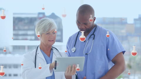 Diverse Medical Doctors Using Tablet Discussing Lab Results