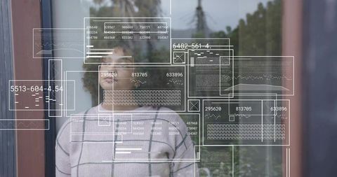 Contemplative woman standing behind glass door with layered digital UI overlays