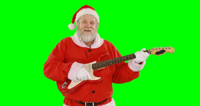 Elderly man dressed as Santa Claus holding and playing an electric guitar. The green screen background allows for easy customization and digital manipulation. Suitable for holiday marketing materials, festive greeting cards, promotional videos, or social media content. Can be used to convey a fun and modern Christmas theme.