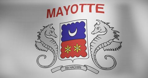 Waving national flag of mayotte with heraldic symbols