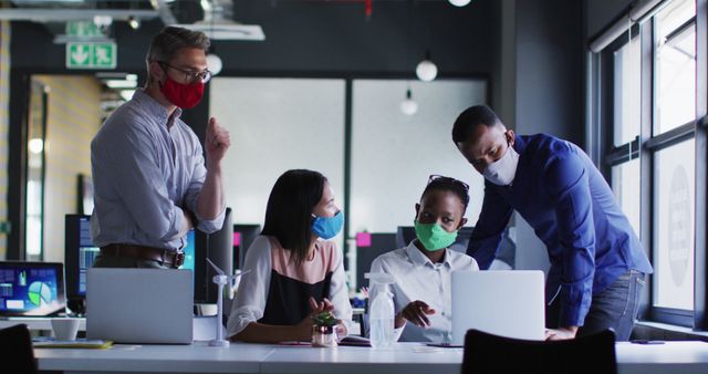 Diverse Business Team Collaborating in Office with Masks - Download Free Stock Images Pikwizard.com