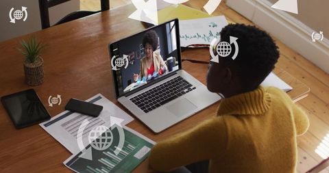 Young boy engaging in virtual learning with tutor