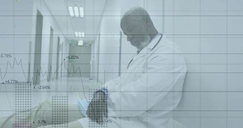 Sitting physician reflecting in clinical corridor holding surgical mask with data overlay