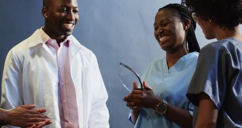 African American Professionals Collaborating in Healthcare Setting
