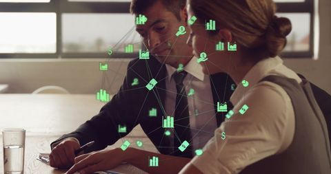 Businessman and Businesswoman Discussing with Digital Data Overlay - Download Free Stock Images Pikwizard.com