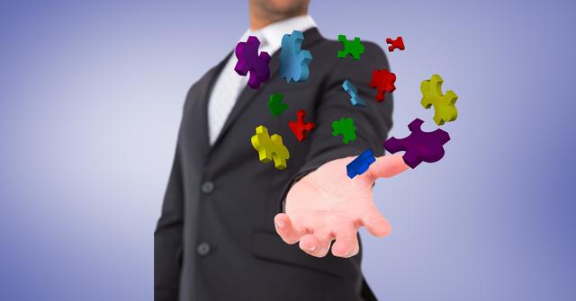 Businessman catching colorful floating jigsaw puzzle pieces, symbolizes problem solving and strategic thinking. Ideal for business concepts, leadership, team synergy, financial advising, marketing and innovation.