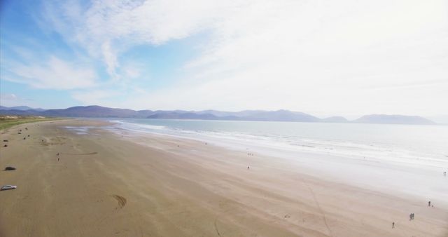 Scenic Wide-Open Beach Under Bright Blue Sky - Download Free Stock Images Pikwizard.com