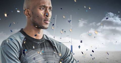 Confetti Celebrating Determined Rugby Player at Inviting Stadium