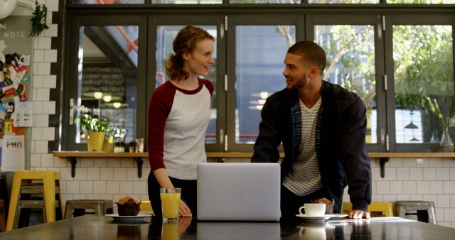 Coworkers Smiling While Working at Modern Cafe - Download Free Stock Images Pikwizard.com