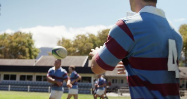 Rugby Player Throwing Ball During Practice Session Outdoors - Download Free Stock Images Pikwizard.com