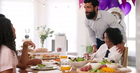 Family Celebrating Special Occasion at Home