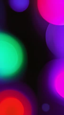Vertical Neon Bokeh Circles Looping Background Video for Mobile Social and Web