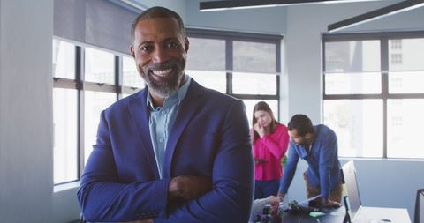 Confident Businessman Leading Diverse Creative Team