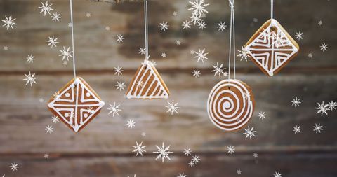 Hanging Gingerbread Holiday Ornaments with Falling Snowflakes