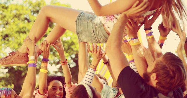 Group of Friends Enjoying Outdoor Music Festival, Crowd Surfing Fun - Download Free Stock Images Pikwizard.com