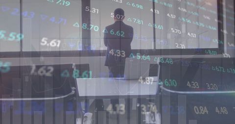 businessman contemplating stock market trends and digital growth - Download Free Stock Images Pikwizard.com