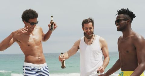 Friends Celebrating Relaxed Beach Day with Drinks