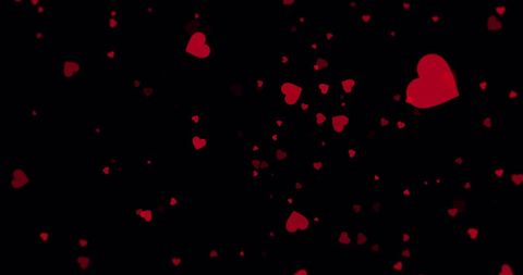 Floating Red Hearts on Black Background for Romantic Designs