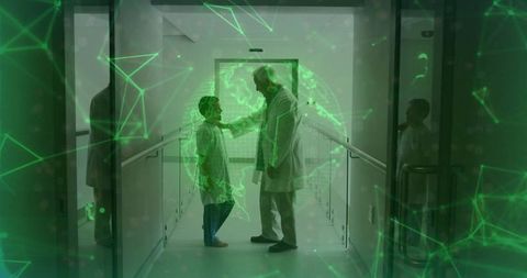 Doctor Guiding Young Boy with Futuristic Digital Globe in Clinic