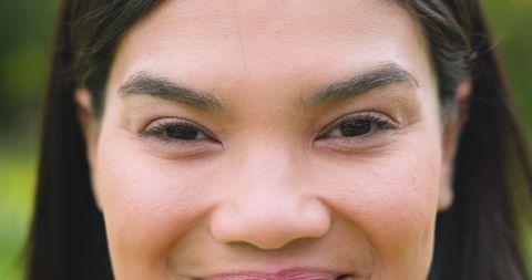 Beautiful woman smiling in garden setting