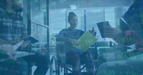 Collaboration Among Diverse Team with Financial Analytics Displayed