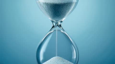 Time Flow in Translucent Hourglass on Blue Surface