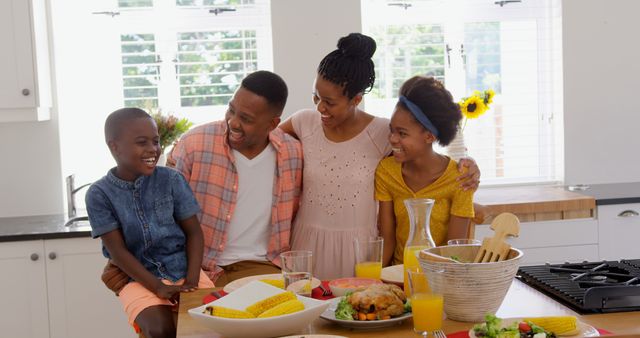 Happy African American Family Enjoying Meal in Modern Kitchen - Download Free Stock Images Pikwizard.com