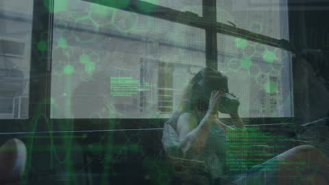 Young Woman Immersed in Augmented Reality with Virtual Data Overlay