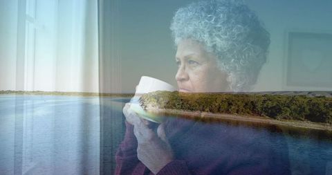 Elderly woman in thoughtful reflection with scenery