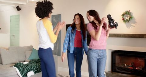 Diverse Female Friends Enjoying Cozy Home Celebration
