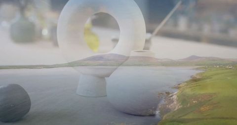 Ethereal fusion of nature and art with ceramic objects at seashore