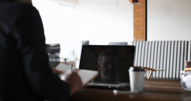 Businessman Reflecting on Laptop Screen in Modern Office - Download Free Stock Images Pikwizard.com