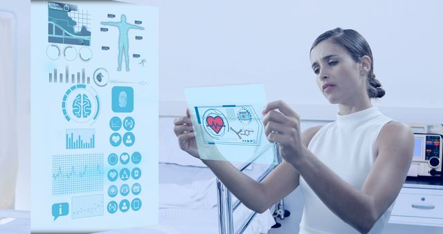 Woman using digital screen in hospital