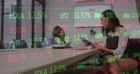 Woman Analyzing Digital Stock Market Data in Modern Office - Download Free Stock Images Pikwizard.com