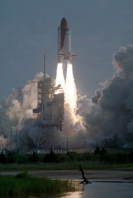 Space Shuttle Atlantis launching on March 24, 1992 from Kennedy Space Center, Florida, carrying the ATLAS-1 payload on the STS-45 mission. This image captures the moment of thrust and ascending flight. Ideal for articles related to space exploration, NASA missions, and aerospace engineering topics.