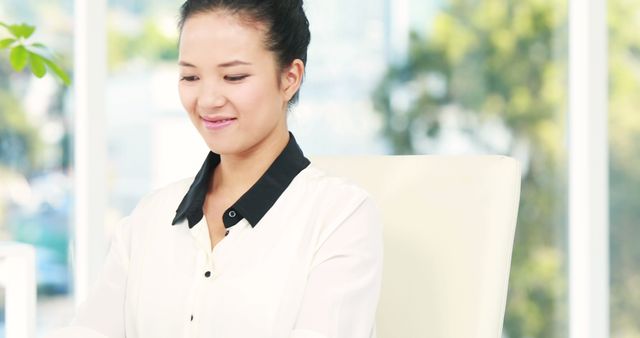 Smiling Businesswoman Working in Bright Office - Download Free Stock Images Pikwizard.com