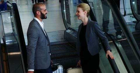 Business Professionals Interacting at Airport - Download Free Stock Images Pikwizard.com