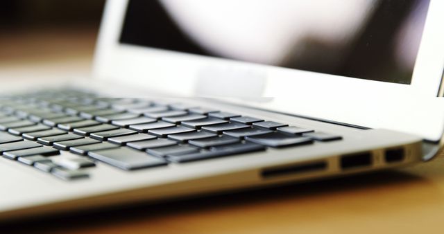 Close-Up of Laptop Keyboard and Screen in Workspace - Download Free Stock Images Pikwizard.com