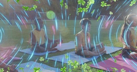 Children practicing outdoor yoga for relaxation and harmony