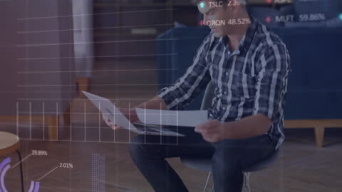 Caucasian Man Analyzing Financial Data with Laptop